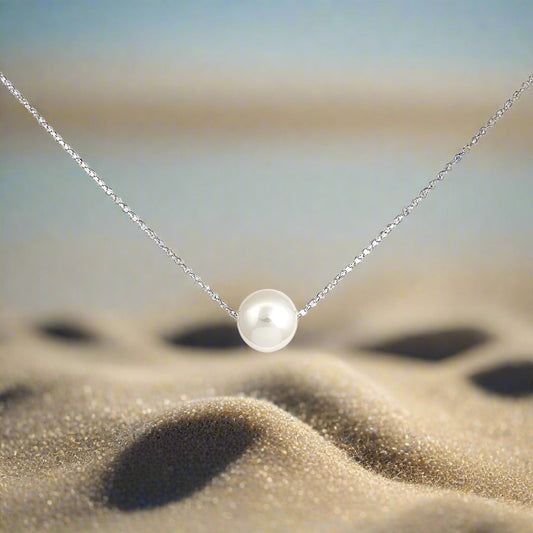 Dainty pearl pendant