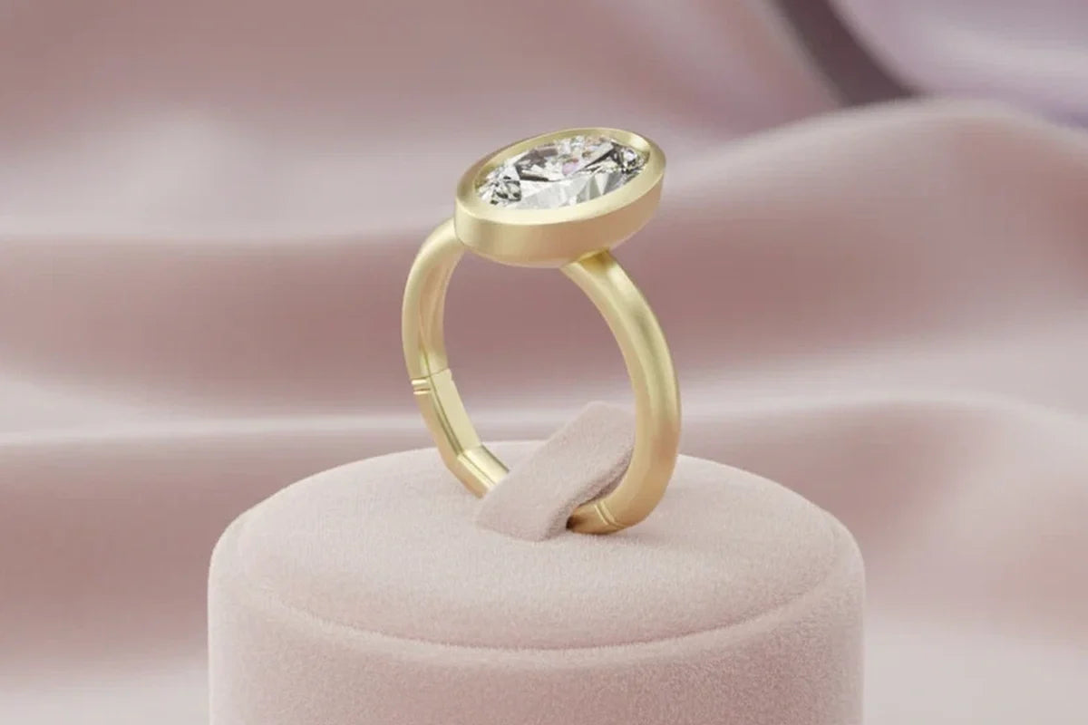 Oval diamond engagement ring with halo setting on a red velvet display