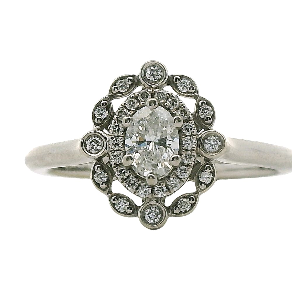 14K WG .33CT SI,HI OVAL DIAMOND WITH .14CTW SI-GH HALO DIAMONDS RINGSIZE 7.5WARRANTY # 376476