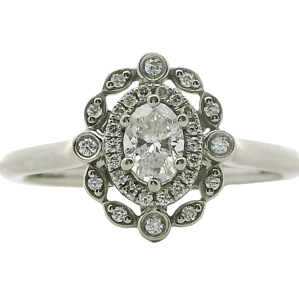 14K WG .33CT SI,HI OVAL DIAMOND WITH .14CTW SI-GH HALO DIAMONDS RINGSIZE 7.5WARRANTY # 376476