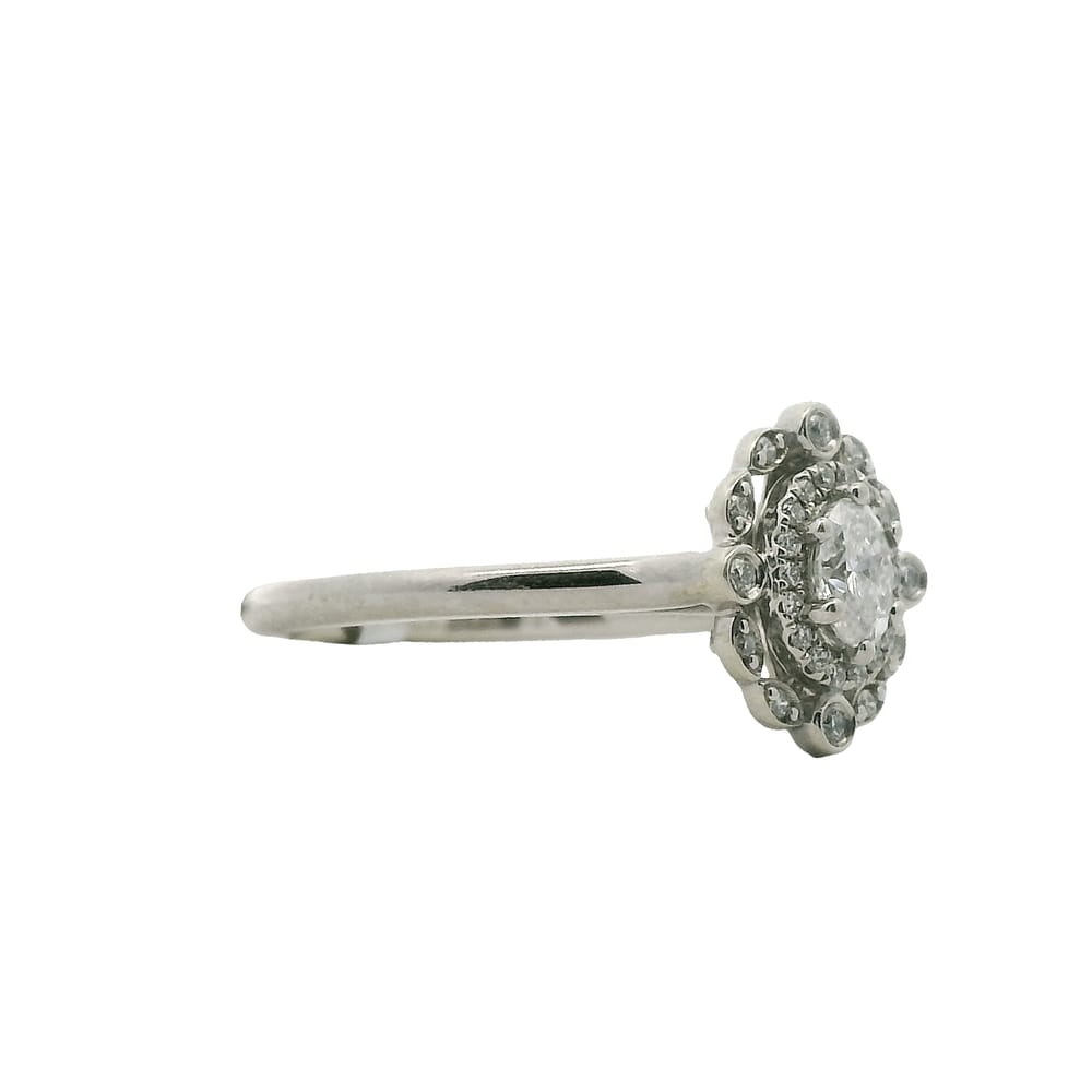 14K WG .33CT SI,HI OVAL DIAMOND WITH .14CTW SI-GH HALO DIAMONDS RINGSIZE 7.5WARRANTY # 376476