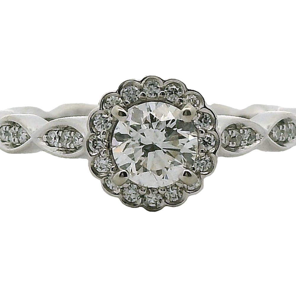 14K WG .50CT SI1 GH WITH .22TW SI GH SIDE STONES