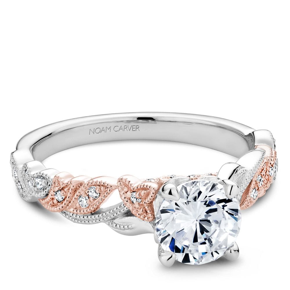 14K White & rose gold ring with a 0.50ct center diamond & diamond mount