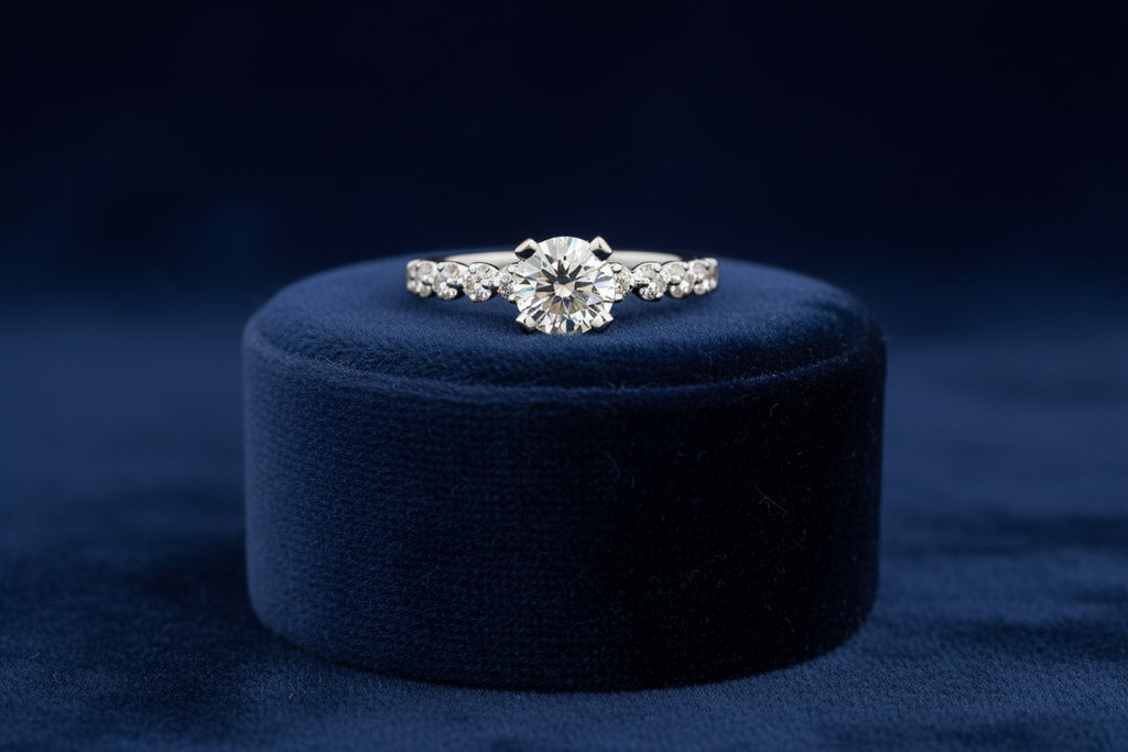 NOAM CARVER14K WG .70CT SI-HI RD DIAMOND CENTER WITH .14CTW SI-GH SIDE DIAMOND RING WARRANTY # 40...