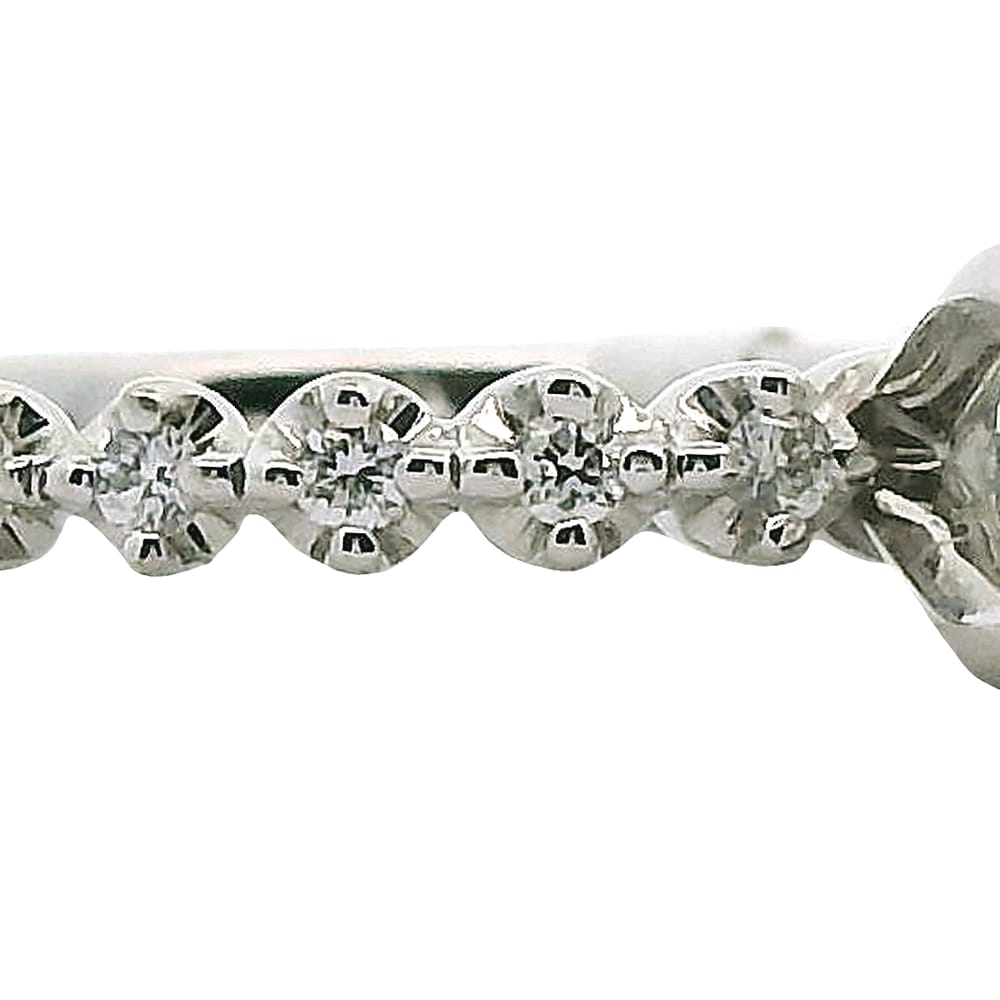 NOAM CARVER14K WG .70CT SI-HI RD DIAMOND CENTER WITH .14CTW SI-GH SIDE DIAMOND RING WARRANTY # 40...