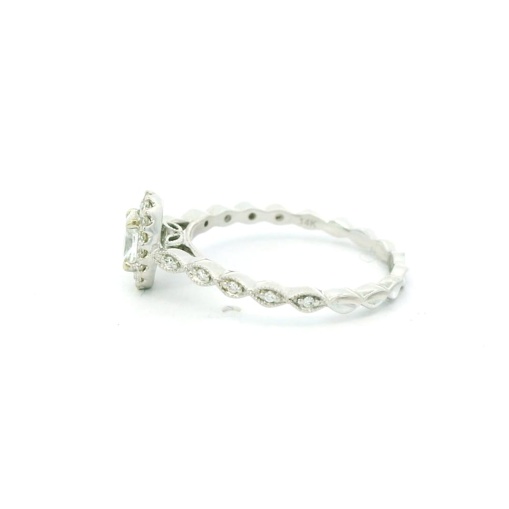 14K WG 0.25ct VVS2,E-F Oval Lab Grown Diamond Ring accented with 0.12ctw Natural diamonds