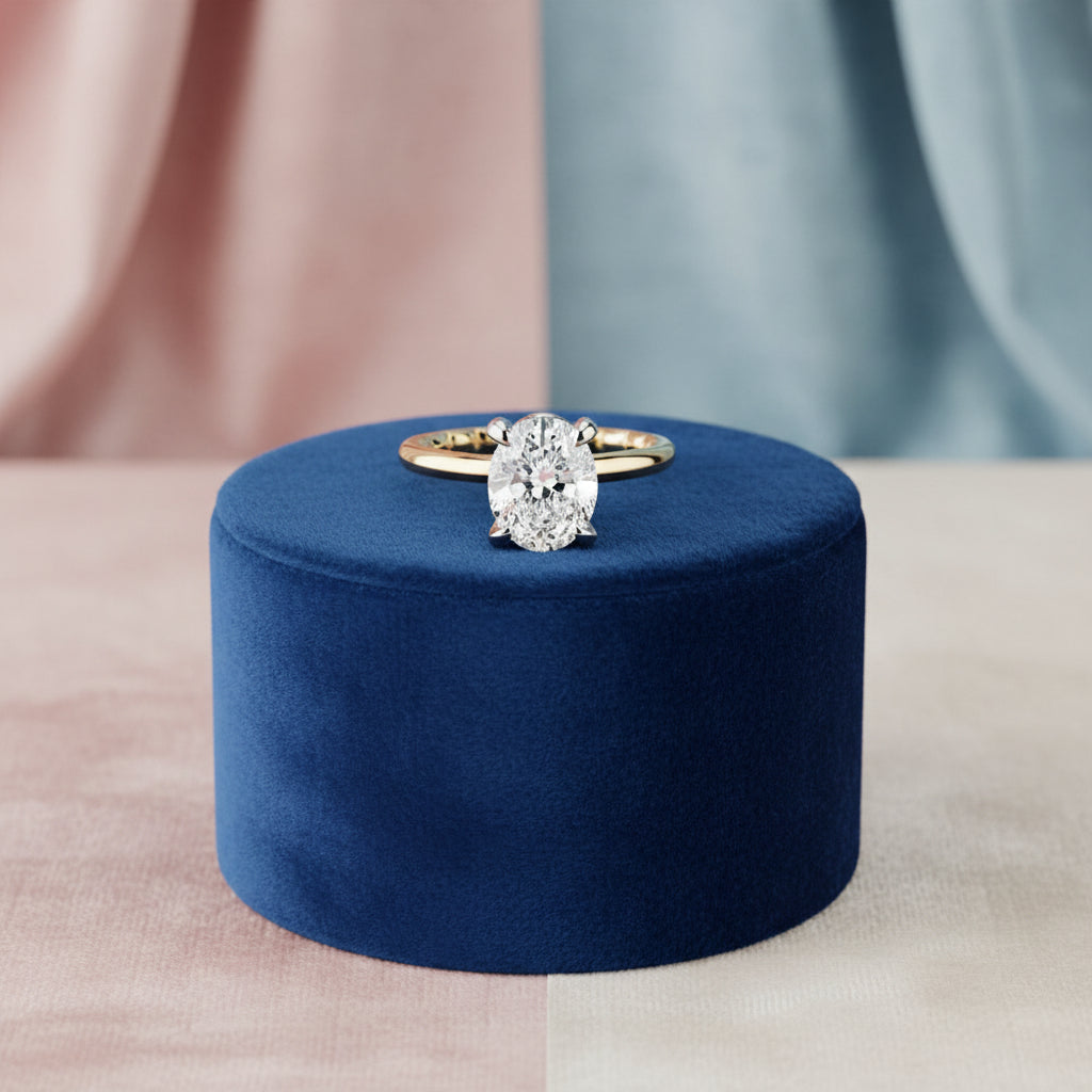 14K Yellow gold solitaire with an oval lab diamond set in a white gold head
