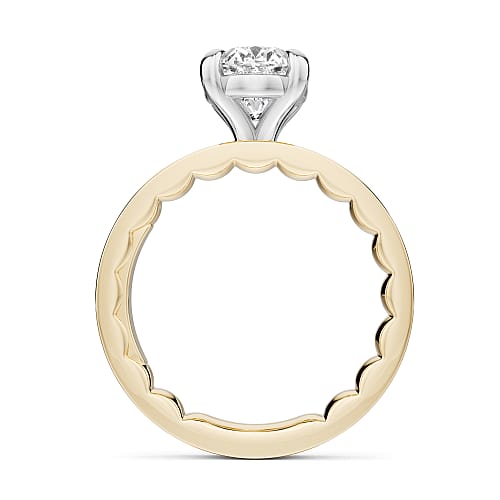 14K Yellow gold solitaire with an oval lab diamond set in a white gold head
