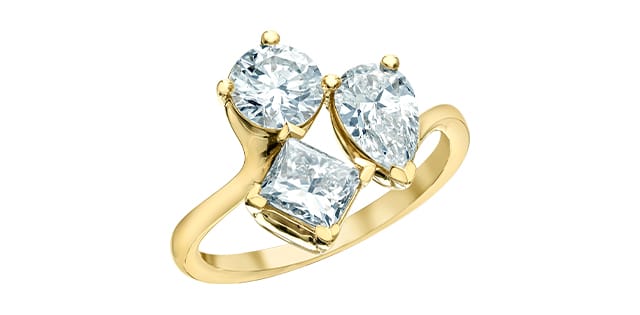14K YG Lab Grown Diamond Ring containing 1=1.07ct Pear Shaped Lab, 1=1.09ct Round Lab & 1.01ct Pr...