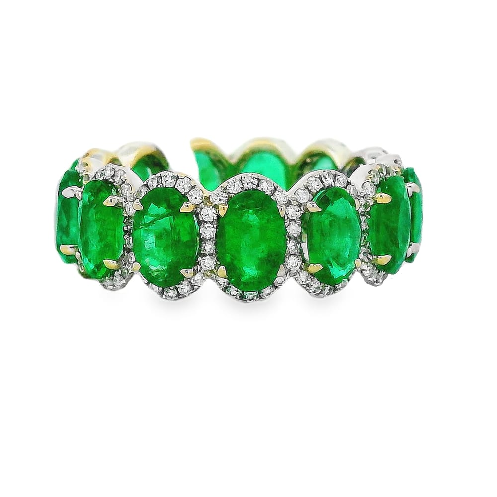 18K WG ETERNITY RING CONTAINING 13=5.52CTW OVAL EMERALDS ACCENTED WITH 182=0.58CTW RD DIAMONDS