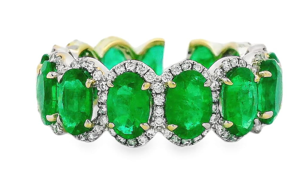 18K WG ETERNITY RING CONTAINING 13=5.52CTW OVAL EMERALDS ACCENTED WITH 182=0.58CTW RD DIAMONDS
