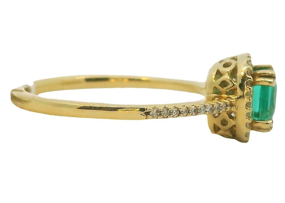 14K YG .65CT EMERALD SET WITH .13TW DIAMONDS.