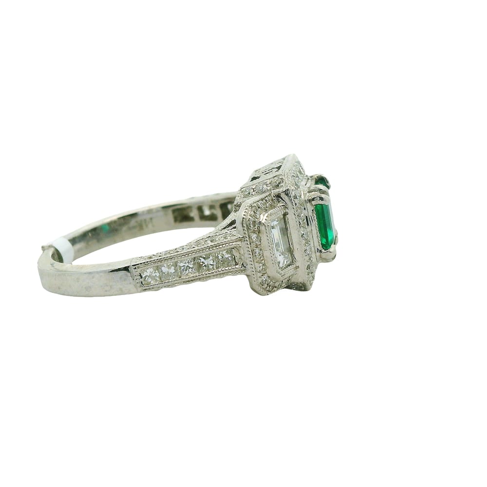 0.87CT EMERALD 0.35CT TW BAGUETTE DIAMONDS 0.18CT TW PRINCESS CUT DIAMONDS 0.36CT TW ROUND DIAMON...