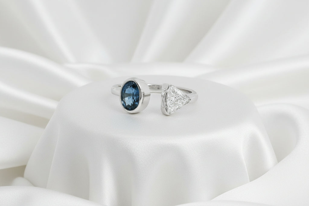 14K WHITE GOLD 0.70CT OVAL BLUE SAPPHIRE AND 0.55CT TRILLIANT DIAMOND I1 I RING SIZE 6.5