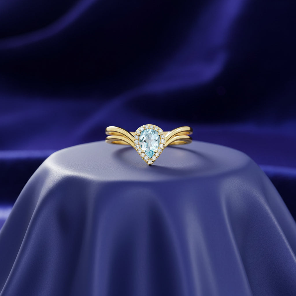10K YG 0.60CT Pear Aquamarine With 0.10CTW Diamond Ring