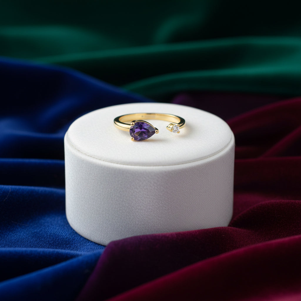 10K Yellow gold open ring with pear shaped amethyst and round diamond