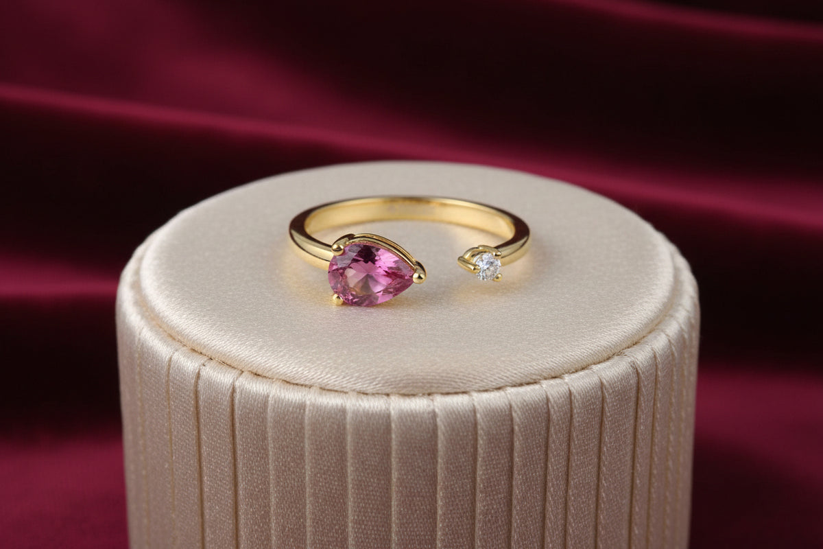 10K Yellow gold open ring with pear shaped London blue topaz and round diamond (copy)