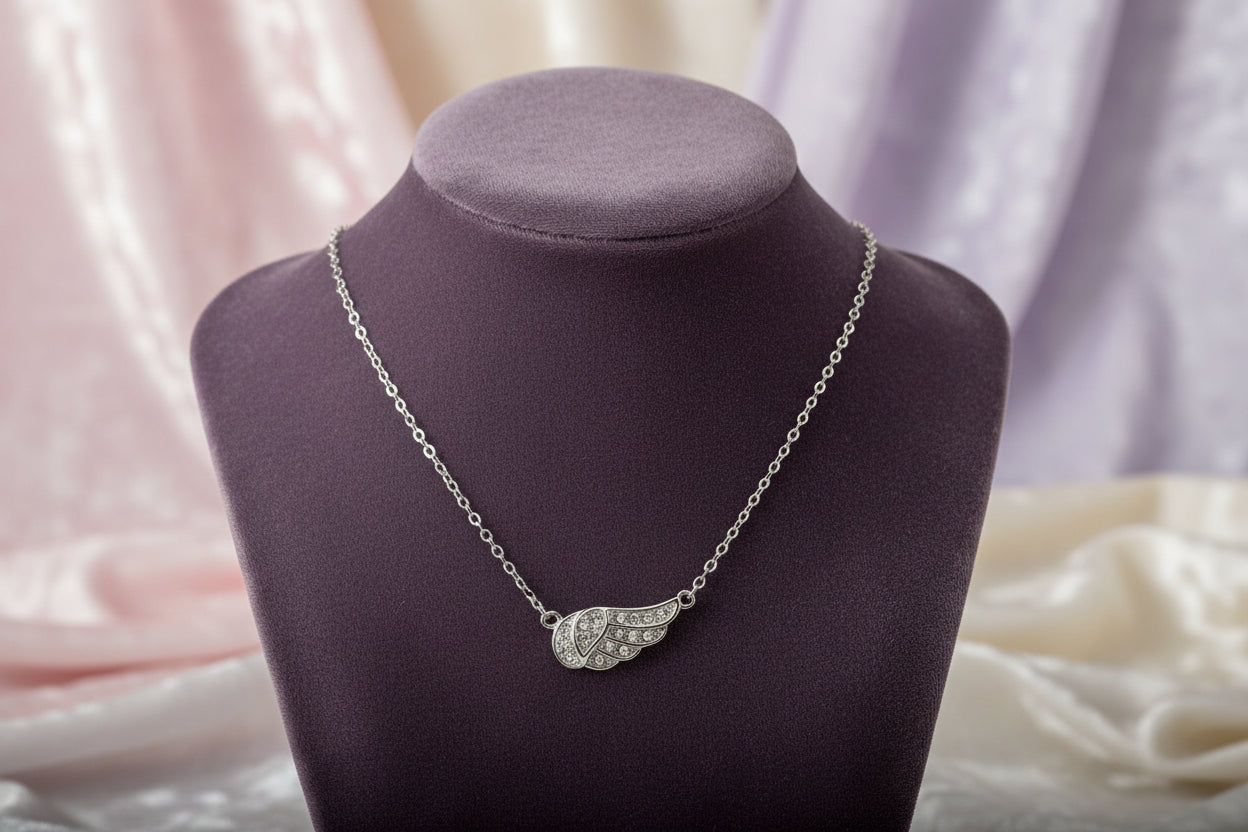 REIGN SS RHODIUM PLATED WHITE CRYSTAL WING NECKLACE