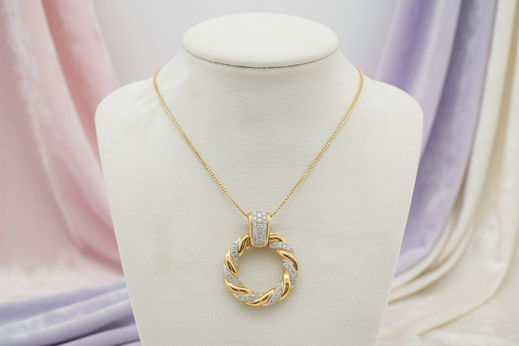 10K YELLOW GOLD FASHION PENDANT SET WITH DIAMONDS, 0.20TW.18" CHAIN INCLUDED.