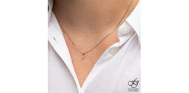 10K .04CT DIAMOND PENDANT AND CHAIN