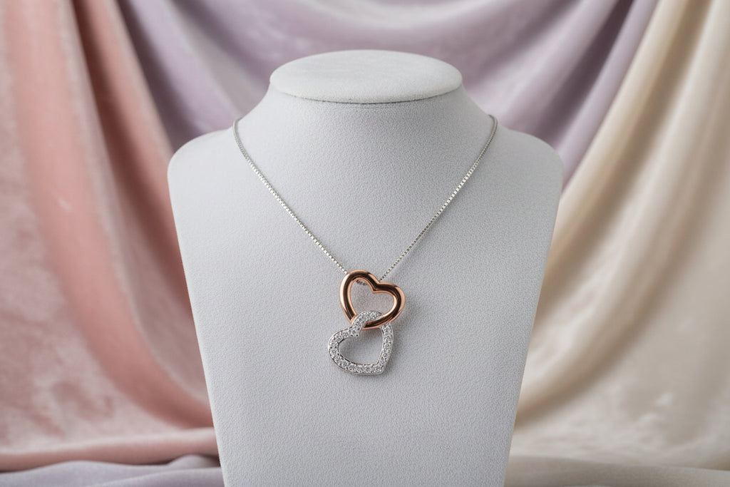 10K WG/RG DBL HEART WITH 0.06CTW DIAMOND PENDANT