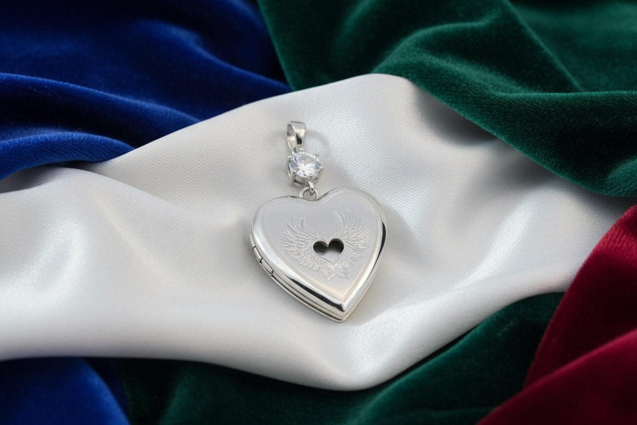 SS RHD 20MM HEART LOCKET WITH ANGEL WING PATTERN & CZ PENDANT