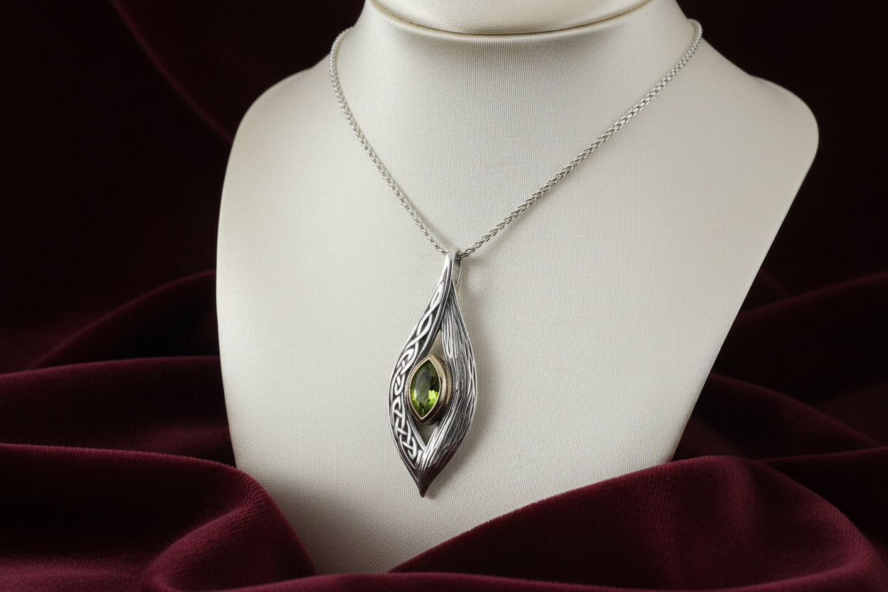 SS 10K YG ETERNITY KNOT PERIDOT PENDANT