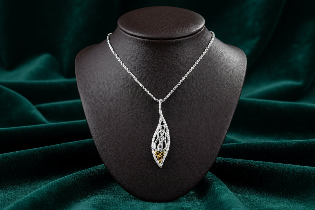 SS RHODIUM + 10K YG W/ CZ BARKED LEAF PENDANT