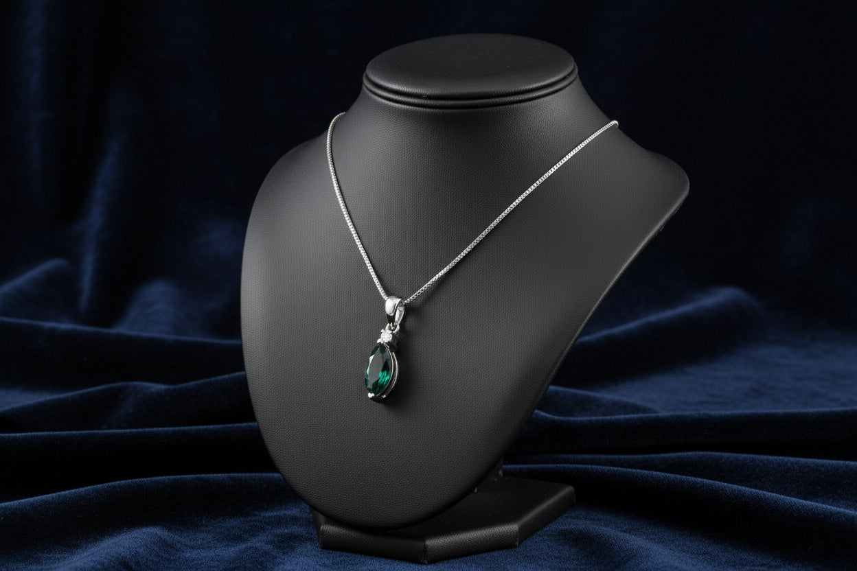 14K WG .80CT BLUE SAPPHIRE & .015CT DIAMOND PENDANT WITH CHAIN