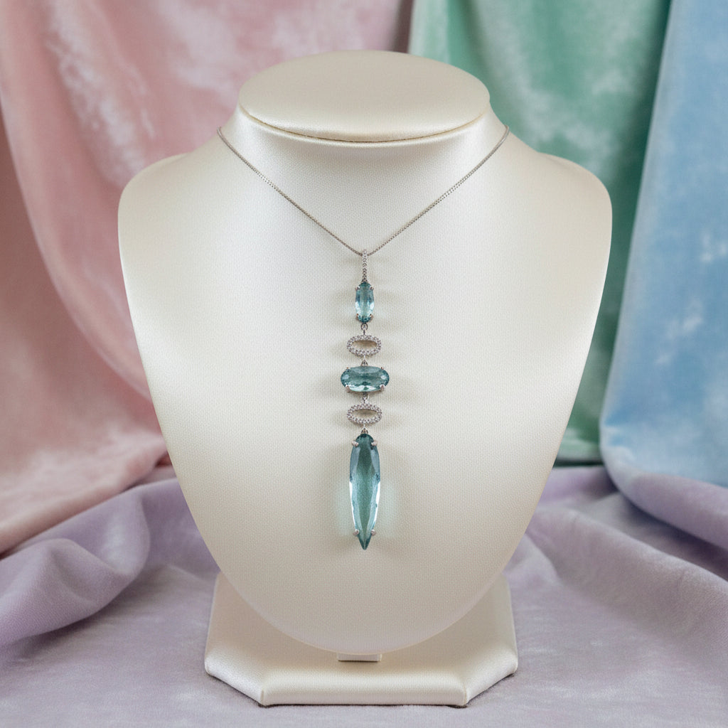 14K White gold london blue topaz and diamond drop pendant