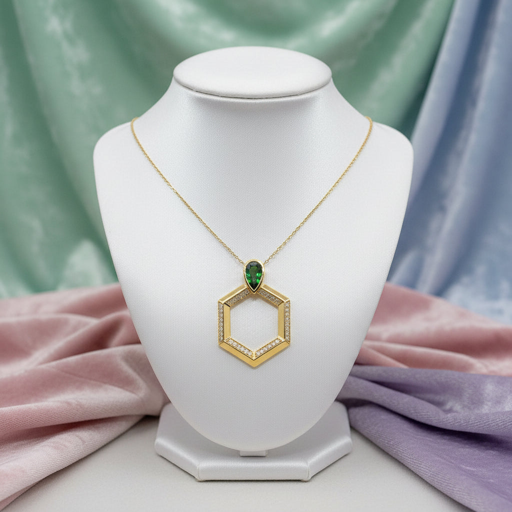 18K Yellow gold tsavorite and diamond hexagon pendant with hidden bale