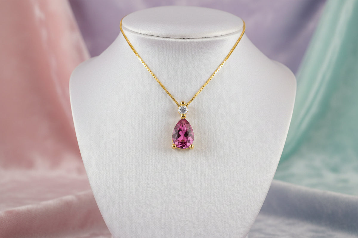 10K Yellow gold pear shaped pink tourmaline and diamond pendant with chain