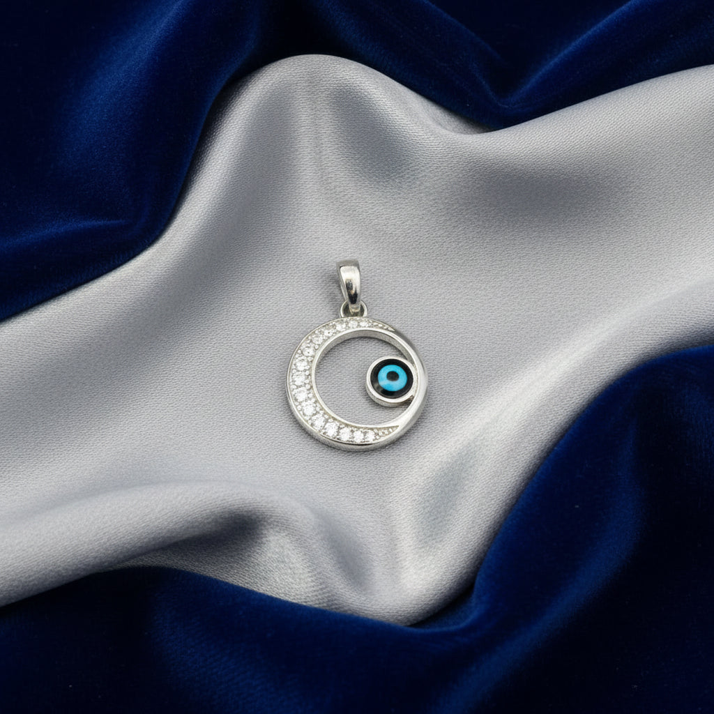 Sterling silver evil eye pendant with CZ's
