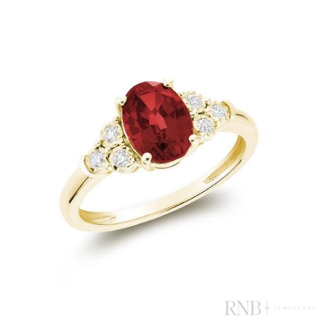 Oval Created Gemstone and Diamond Ring
