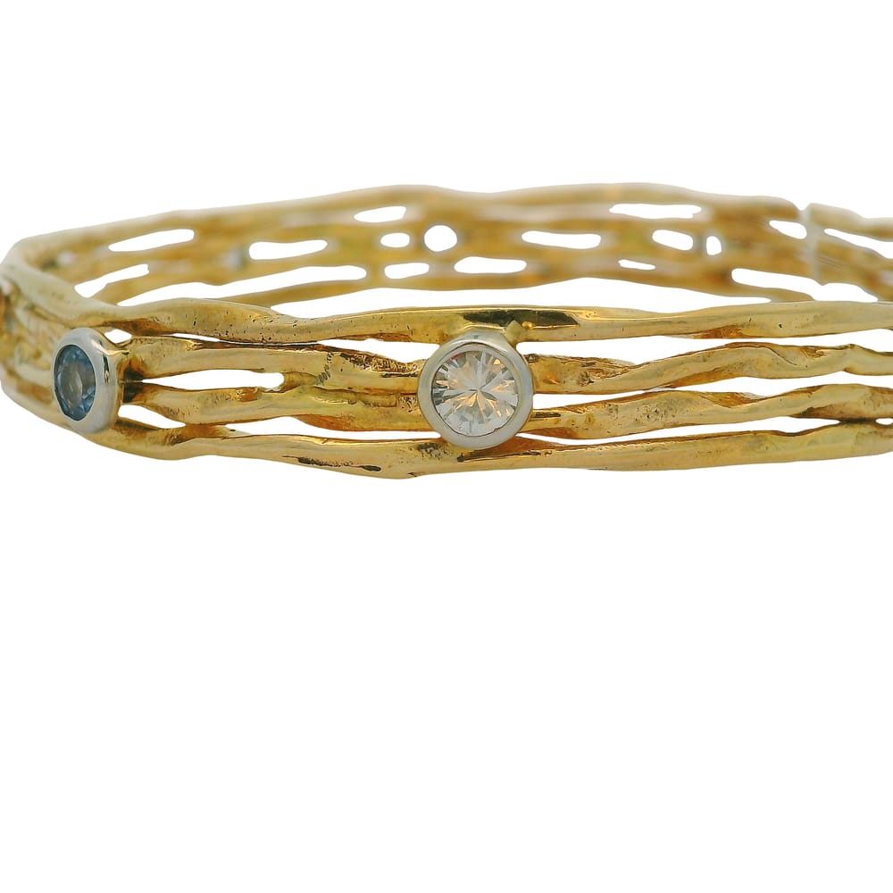 10K TWO TONE BRACELET WITH BLUE AND WHITE SAPPHIRES