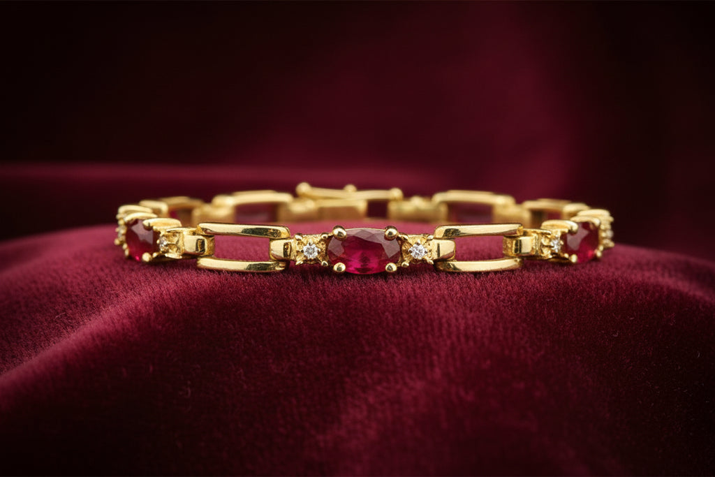 10K YG 5X3 OVAL RUBIES WITH 0.10CTW DIAMOND BRACELET