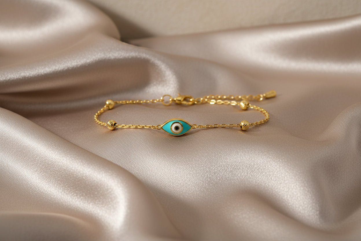 10K YG Blue Evil Eye Bracelet - 7.5"