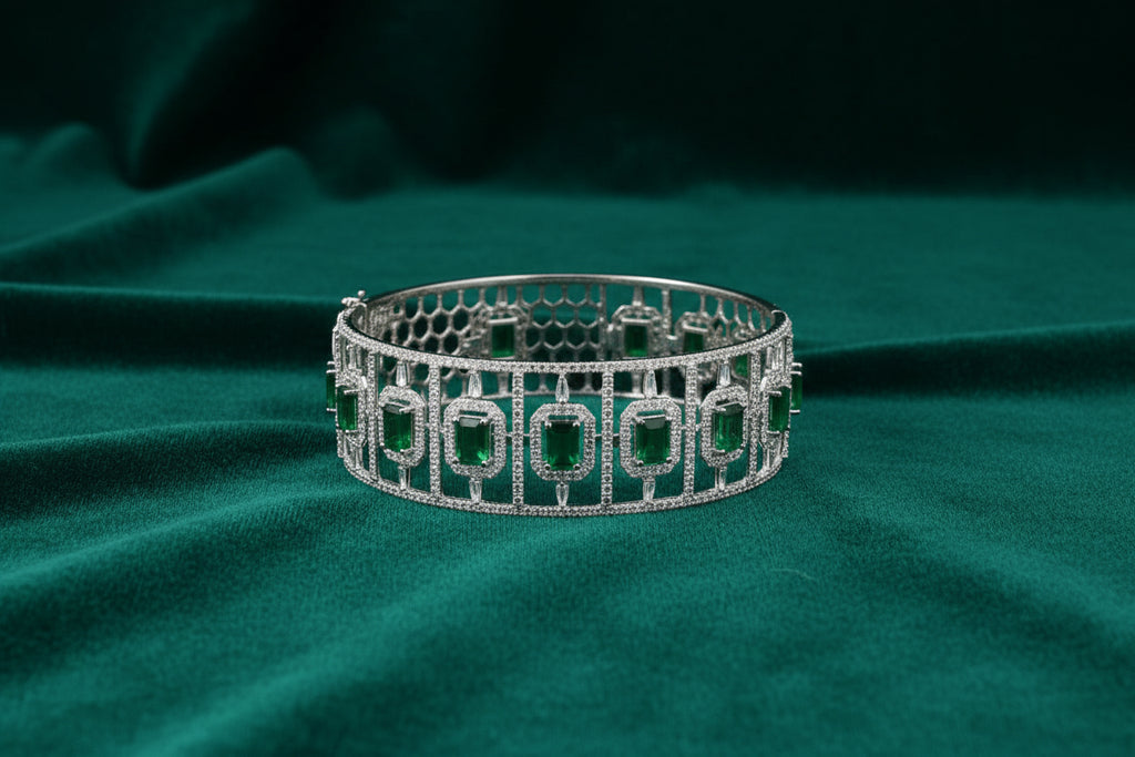 10K WG 4.70ctw Emerald Hinged Bangle with 7.90ctw RD/BG/EM Cut Diamonds