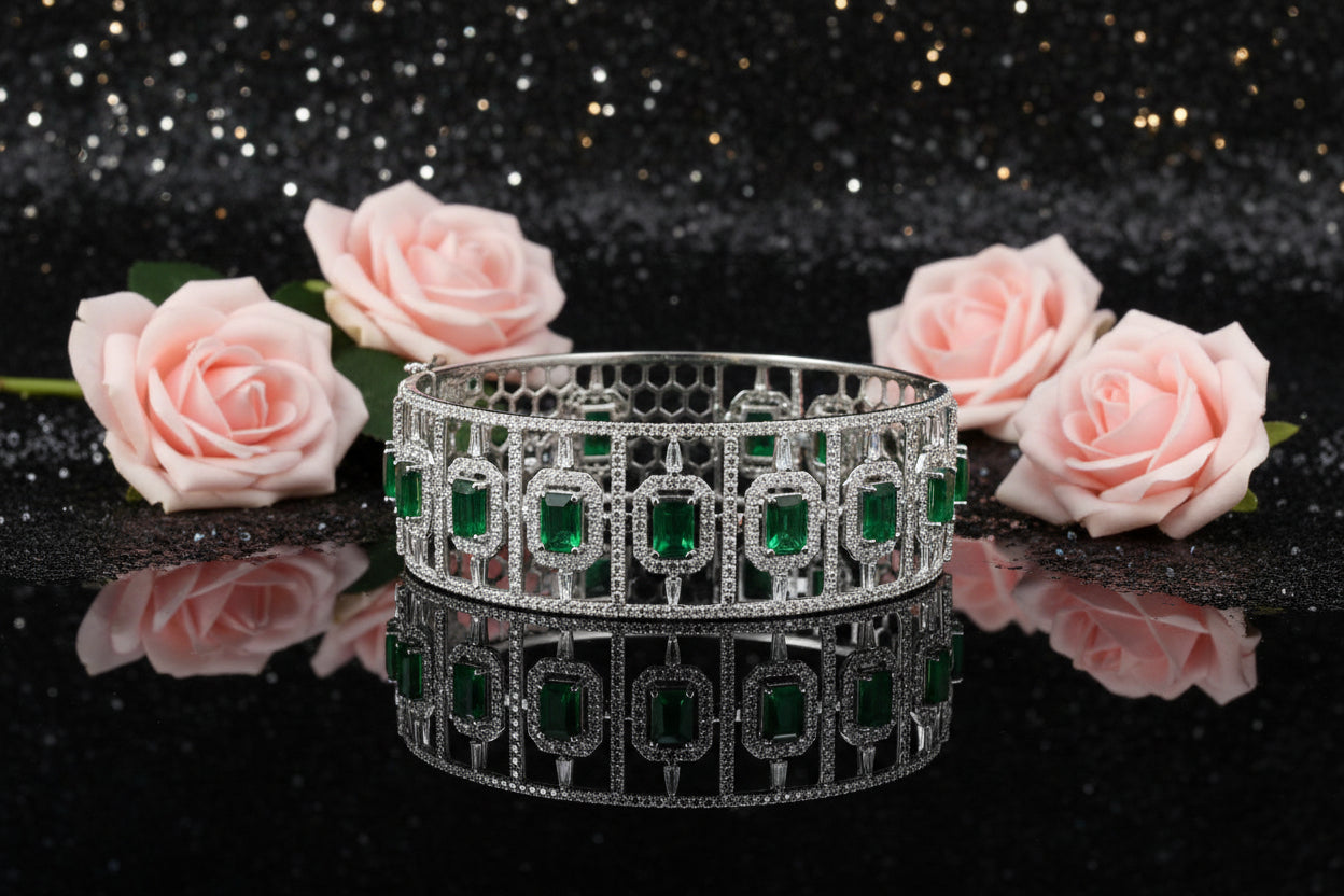 10K WG 4.70ctw Emerald Hinged Bangle with 7.90ctw RD/BG/EM Cut Diamonds