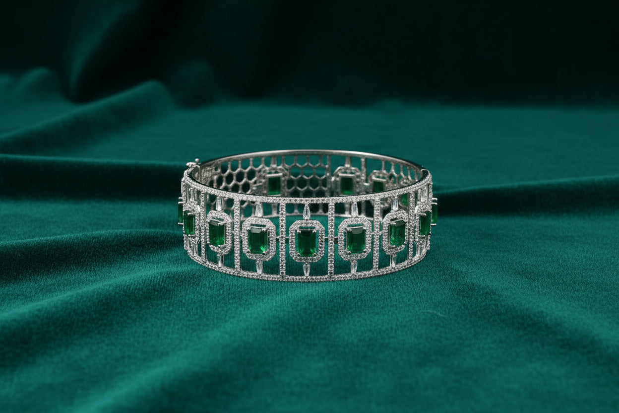 10K WG 4.70ctw Emerald Hinged Bangle with 7.90ctw RD/BG/EM Cut Diamonds