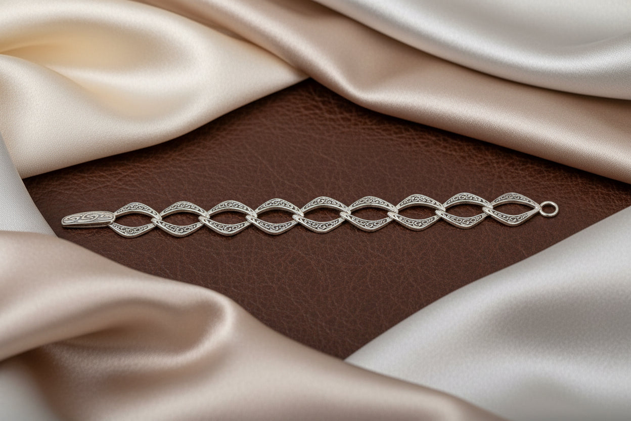 SS CELTIC KNOT LINK BRACELET WITH PUSH CLASP 7.25"