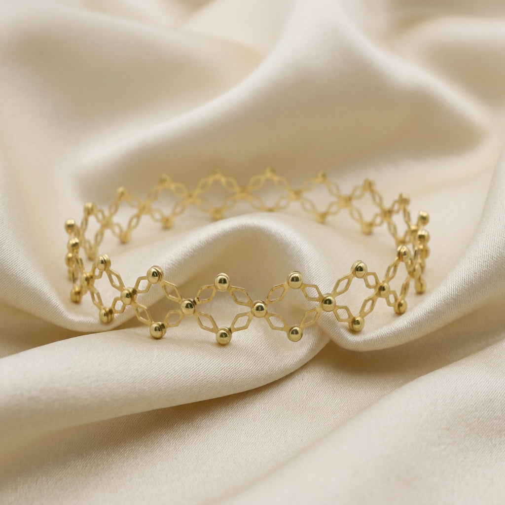 10K Yellow gold evolution bangle