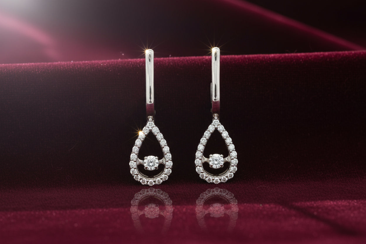 10K WG .16TW DIAMOND PULSE EARRINGS WITH .24TW SIDE DIAMONDS