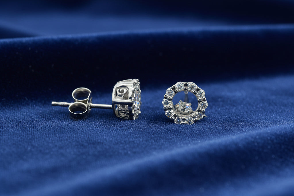 10K WHITE GOLD .10TW DIAMOND PULSE EARRINGS SURROUNDED BY .20TW SIDE DIAMONDS