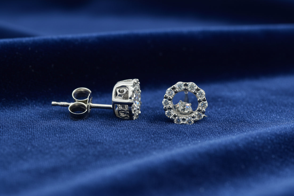 10K WHITE GOLD .10TW DIAMOND PULSE EARRINGS SURROUNDED BY .20TW SIDE DIAMONDS