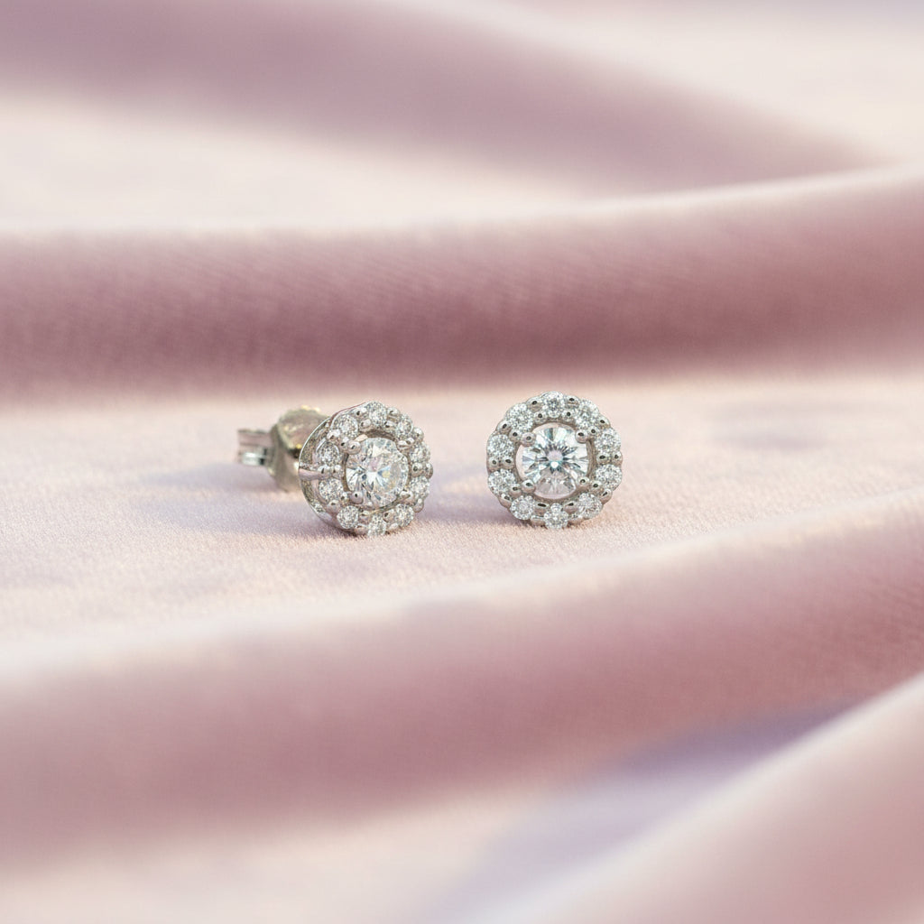 10K WHITE GOLD .10TW DIAMOND PULSE EARRINGS SURROUNDED BY .20TW SIDE DIAMONDS