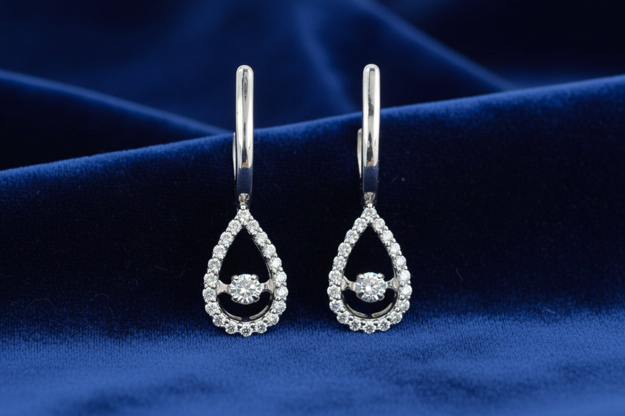 10K WG .16TW DIAMOND PULSE EARRINGS WITH .24TW SIDE DIAMONDS