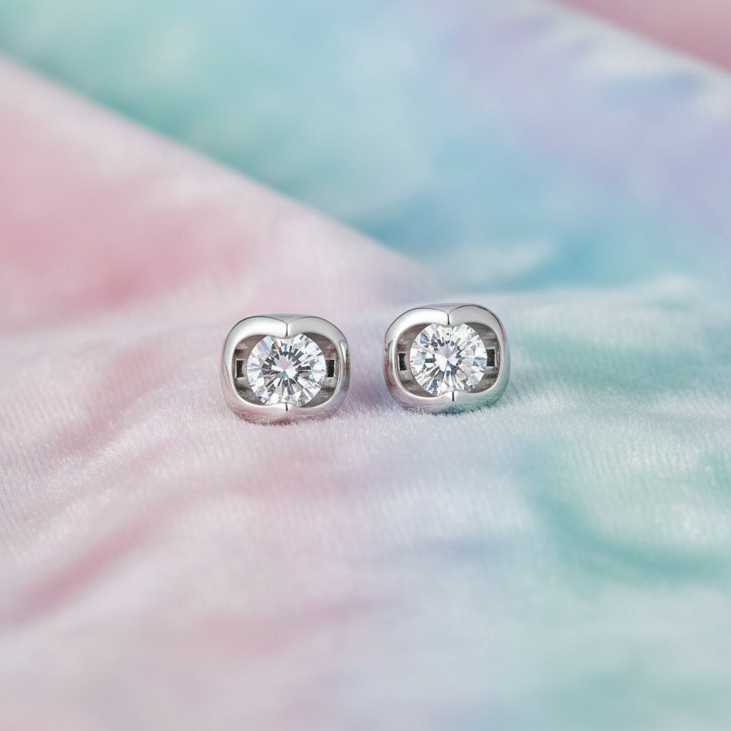 10K WG .06TW DIAMOND STUDS