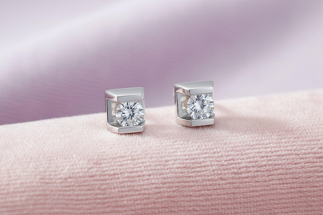 10K WG .06TW DIAMOND STUDS