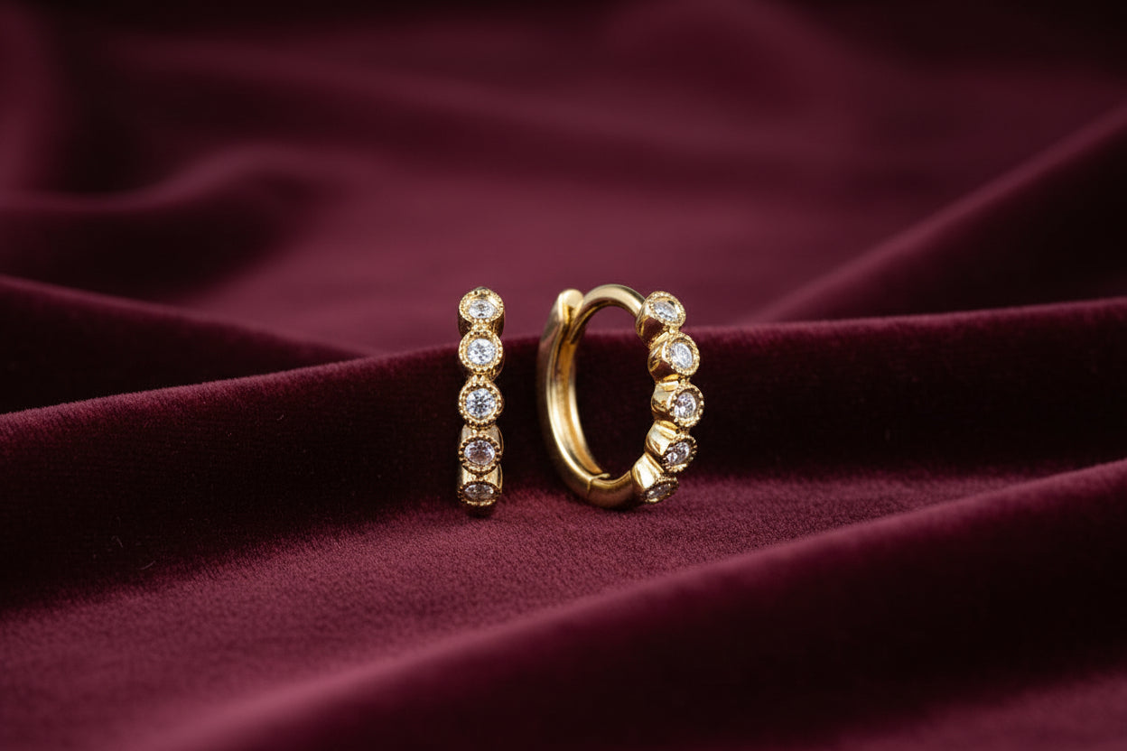 (S2220068) 14K YG 0.06ctw SI Diamond Bezel Set Huggies "Gabriel & Co."